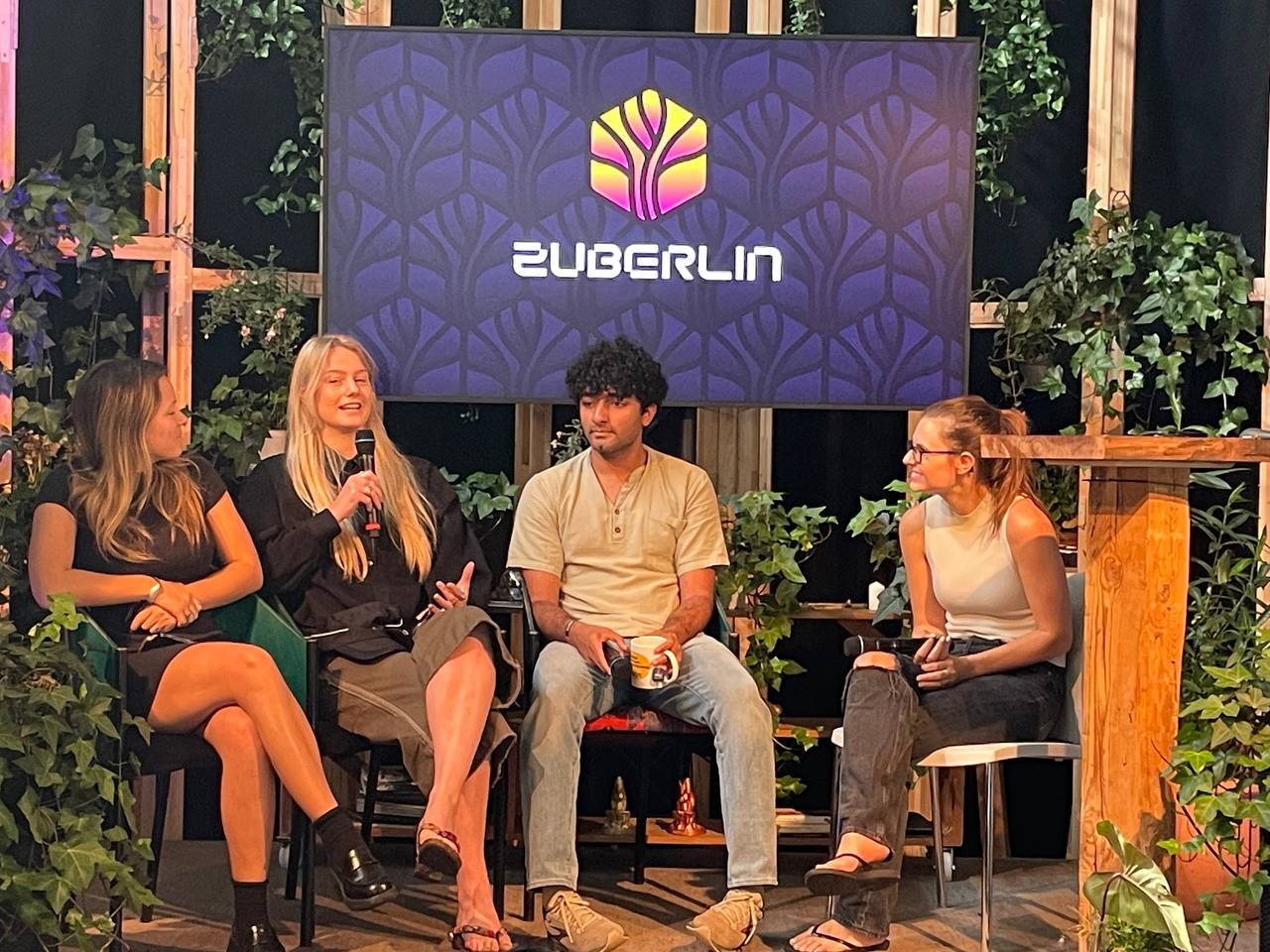 Madvi speaking on a ZuBerlin panel about decentralized AI